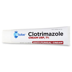 A white 1 oz tube of Globe Clotrimazole Cream USP 1% by Globe, labeled with blue and red text, lies on a white background. This antifungal cream is used to treat athlete's foot or jock itch.