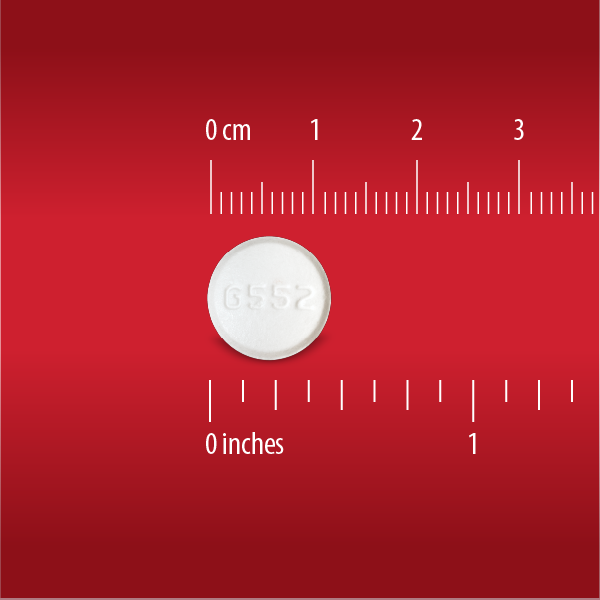 A white round pill marked “6552,” about 1 cm (0.4 in) wide, is shown on a red background with rulers. It’s Globe Extra Strength Acetaminophen 500 mg for pain and fever relief—50 packets of 2 tablets each.