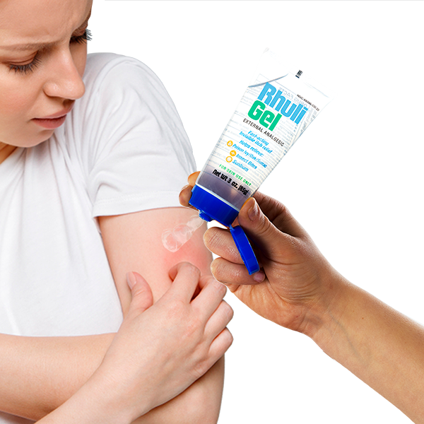 A person applies Rhuli Gel Anti-Itch Gel from a 3 oz tube to a red, irritated area on their upper arm for cooling relief from bug bites, sunburn, poison ivy, and other skin discomforts.